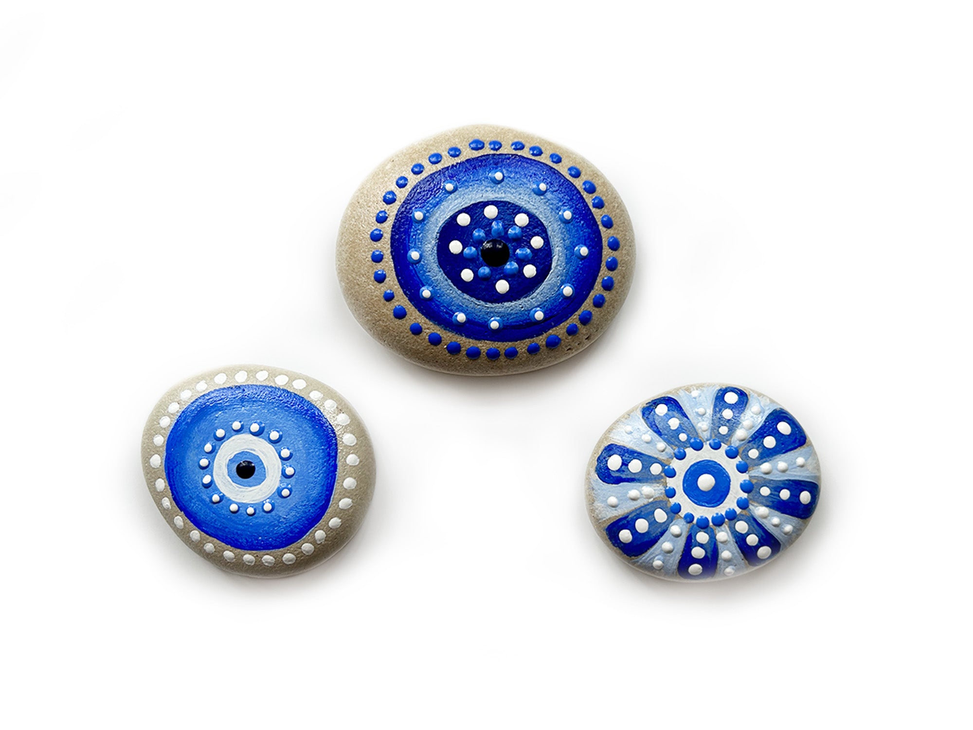 Check out our Blue Coastal Jewels created from shoreline stones. Ideal decorative bowl fillers or stand-alone eye-catching beach décor. Experience coastal life every day with our treasured reminders! Our stones have been hand-selected while walking the shoreline. Each stone is uniquely shaped and smoothed from the water and motion of waves. Stones have been washed, painted and sealed. Stone size ranges from 1 1/2 to 2 1/2 inches long. Blue home decor - tribegift.com