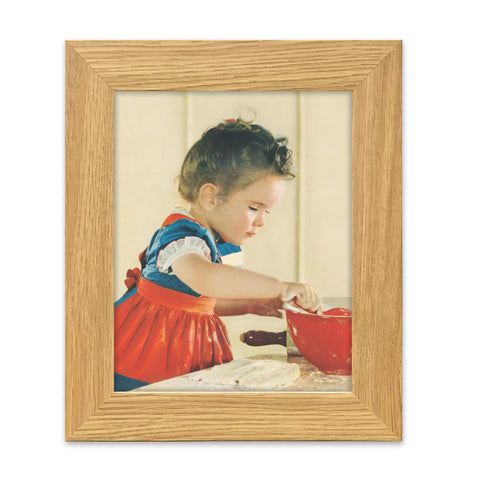 This young lady can bake "All By Herself." Vintage baking 1900s calendar print depicts a young woman with determination. Love the red apron with the blue and white dress! Vintage print reproduction measures 8 x 10 inches. The red, white and blue color story definitely speaks patriotism. Printed on durable cover stock with soft velvet finish. tribegift.com