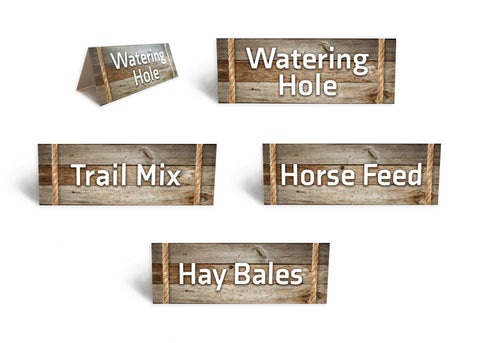 Food station signs for your horse theme celebration! Perfect for your food table. 4 paper tent-fold signs designed on wooden background. “Watering Hole” sign announces your water bottle location. “Trail Mix” sign pairs well with your snack mix bowl. “Horse Feed” sign playfully enhances your fruits and vegetables. “Hay Bales” sign definitely announces your desserts - all cut up into squares! Art printed on paper with soft velvet finish. Perfect for your horse-themed celebration!  tribegift.com