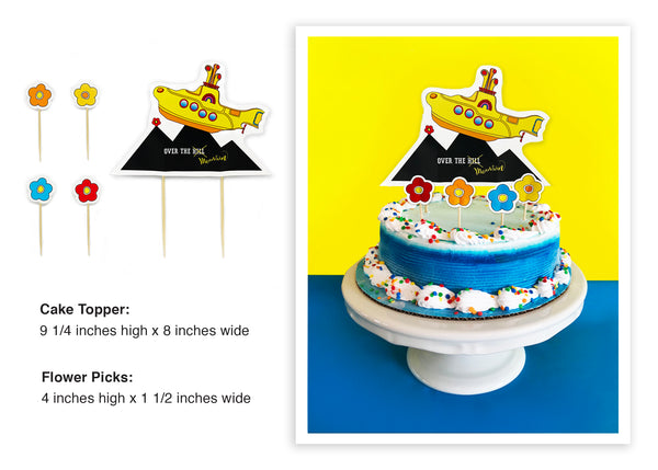 A bold and brave Yellow Submarine makes its way over the peak of a mountain within this cake topper.  This is no average “Over the Hill Party” experience. We are talking mountains - not hills. Cake topper showcases a yellow submarine making its way over a mountain peak. Four flower cake picks come with this cake topper. All picks are made out of 100% Natural Bamboo - biodegradable! - tribegift.com